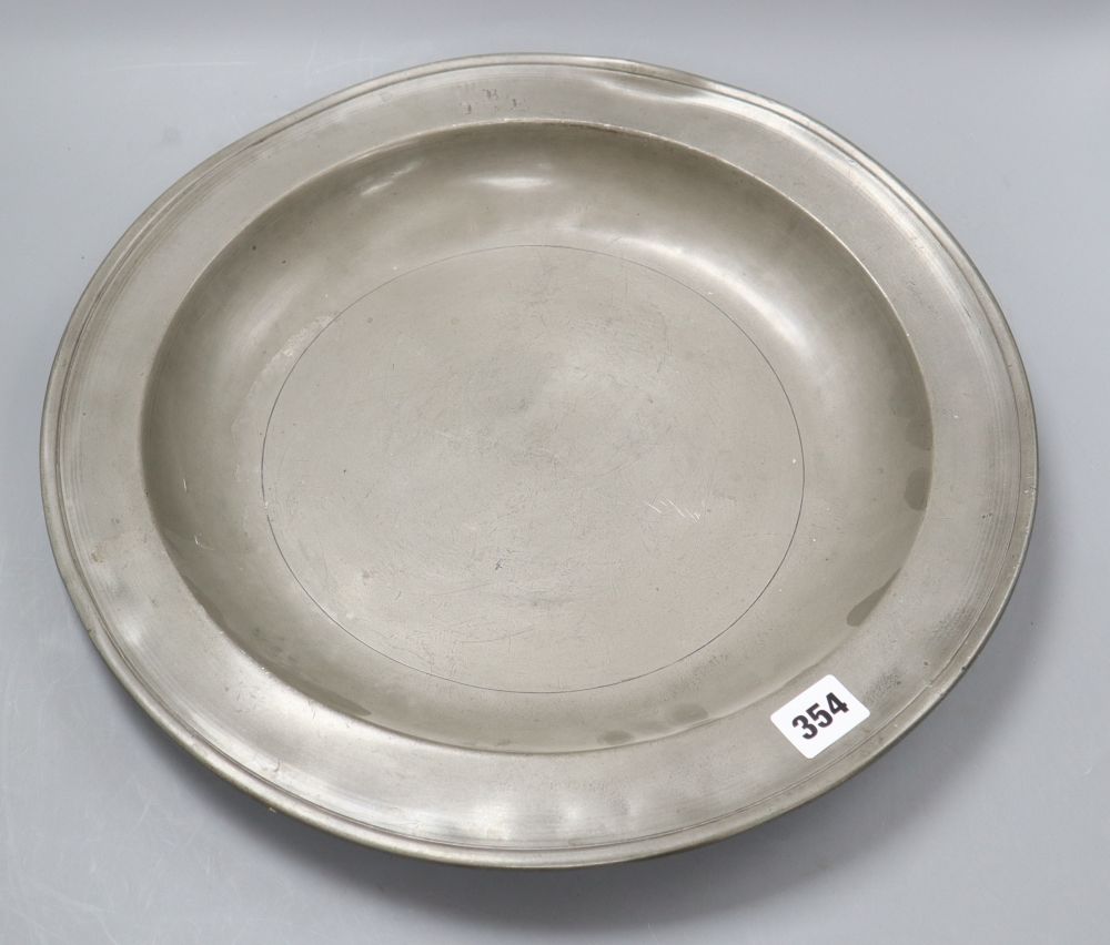 A pewter charger, c.1880. Provenance: North Mymms Park, Hertfordshire, diameter 42cm